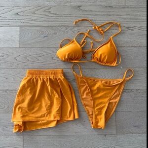 Chic Orange Bikini Set with Skirt